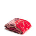 Folded Vera Bradley Plush Throw Blanket in Coming Up Roses Pink featuring large red and magenta roses on a blush pink background.