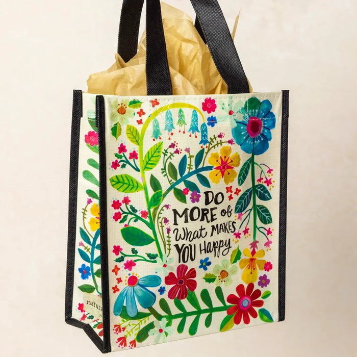 Tote bag featuring a floral design, emphasizing a theme of nature and beauty beyond just flowers.