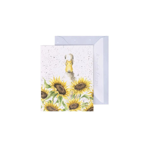 A greeting card featuring a cheerful duck surrounded by vibrant sunflowers against a bright background.