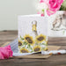 A whimsical greeting card illustrating a duck with bright sunflowers, perfect for sending cheerful wishes.
