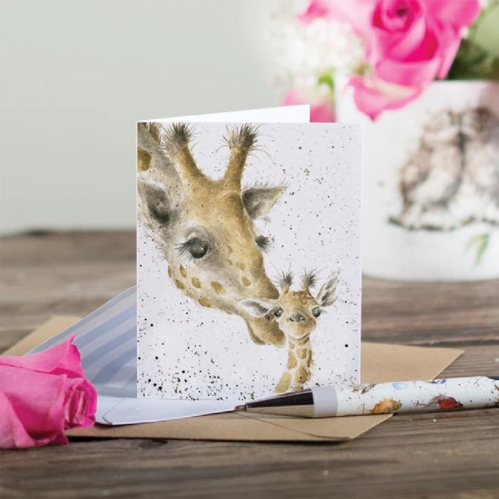 A card displaying a mother giraffe and her calf, showcasing their bond in a vibrant landscape.