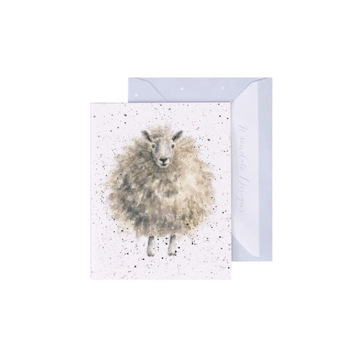  A greeting card featuring a cute sheep illustration on the front, perfect for sending warm wishes.