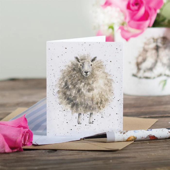 A whimsical greeting card showcasing a sheep, suitable for conveying friendly messages.