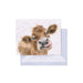  A card featuring a close-up of a cow's face with expressive eyes and a gentle expression.