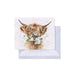  A charming greeting card showcasing a highland cow, characterized by its distinctive long hair and gentle expression.