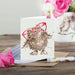  An illustrated card displaying an owl with glasses, symbolizing wisdom and charm.