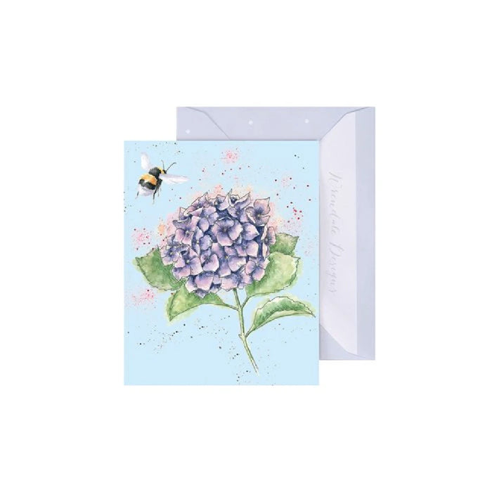 A card featuring a bee perched on a vibrant hydrangea flower against a soft background.