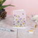  A decorative card showcasing a daisy flower with a bee perched on it, set against a gentle backdrop.
