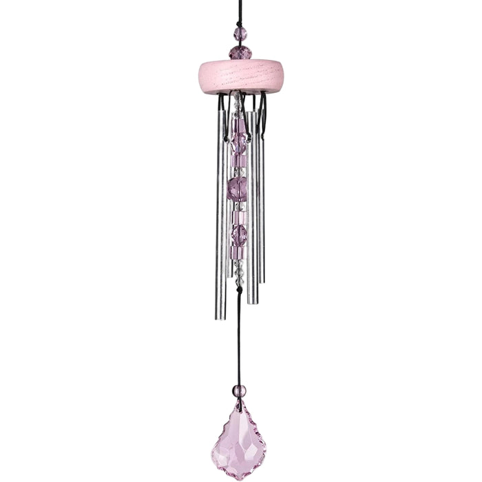 Pink wind chime with crystals on a white background