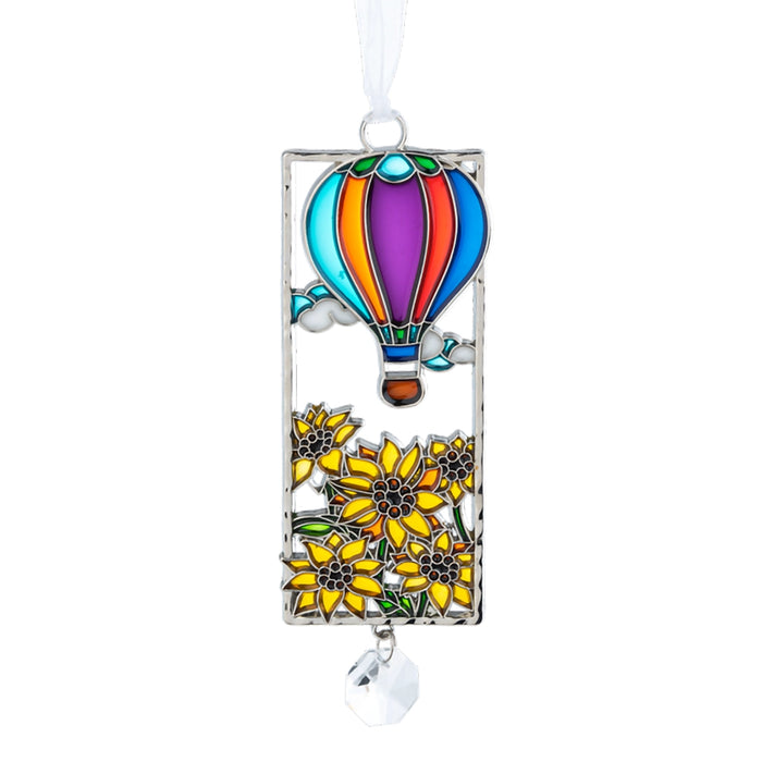 Decorative Ganz hanging ornament with a colorful hot air balloon and sunflowers on a white background