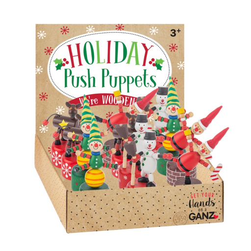 Box of Holiday Push Puppets with wooden figures on a white background
