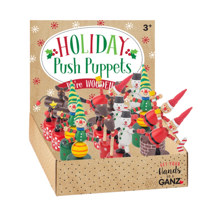 Box of Holiday Push Puppets with wooden figures on a white background
