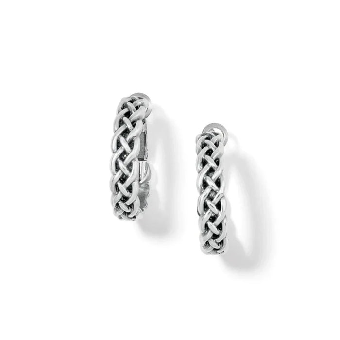 Elegant silver hoop earrings showcasing a unique braid design.