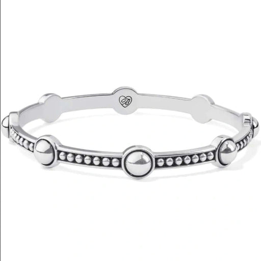 The Brighton Pretty Tough Stud Bangle combines edge and elegance in one striking piece.