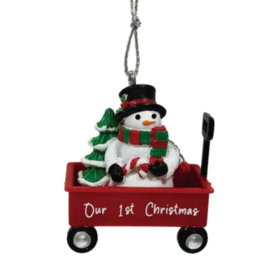 This Ganz Our 1st Christmas Christmas Ornament is a special keepsake that celebrates a couple’s first holiday season together.