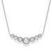 This elegant piece features a slightly curved bar with a petite circular dome at the heart of three stones on either side. A truly precious little treasure, that suspends from a fine delicate chain.