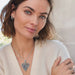 Halo Heart Necklace featuring an elegant heart pendant surrounded by a delicate halo