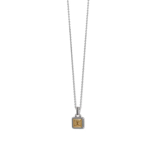 A small square pendant hanging from a gold and silver chain, showcasing a blend of elegant metals.