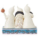 Back view of Jim Shore Ghosts with Boo figurine showcasing intricate swirl patterns on the ghosts’ robes.
