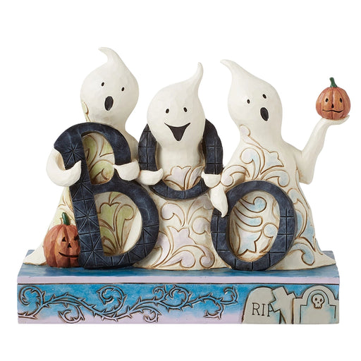 Jim Shore Ghosts with Boo figurine featuring three smiling ghosts holding black letters spelling 'BOO' with pumpkins at their feet.