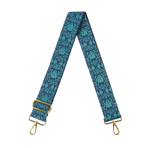 Blue floral patterned strap with gold hardware on a white background