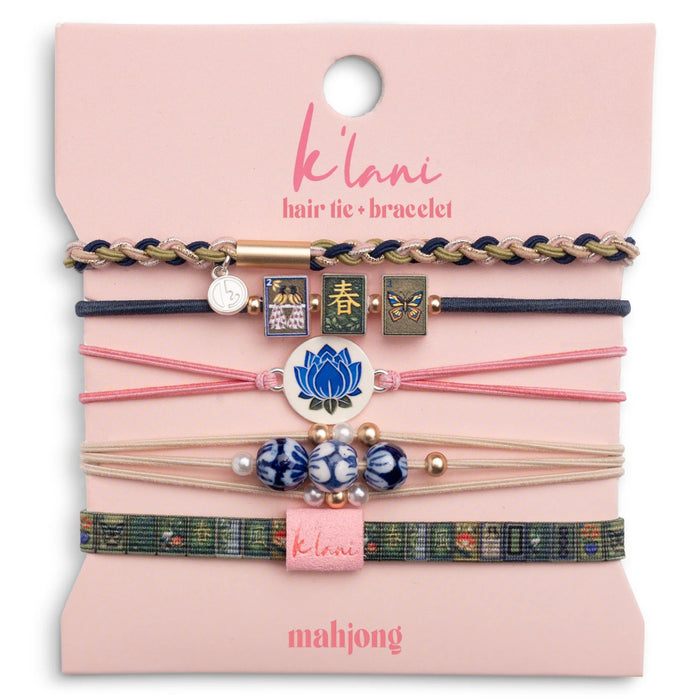 Medium Mahjong-themed hair tie bracelets in pink, green, and blue with lotus flower and Mahjong tile accents.
