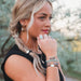 Medium butterfly hair tie bracelet with a natural-inspired design and elegant earthy tones.