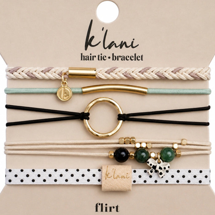 Flirt medium hair tie bracelet set featuring neutral elastic bands with gold accents and decorative charms.