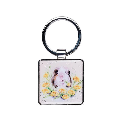  Keyring featuring a guinea pig basking in the sun, showcasing its fur and playful expression.