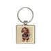 A dachshund dog is featured on a square key chain, showcasing its playful expression and distinctive long body.