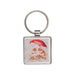 A square keychain featuring two owls standing together under a colorful umbrella.