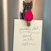 A card saying "Happy Clips" accompanied by two cat clip magnets, highlighting a fun and whimsical theme.
