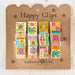 Colorful floral print clips arranged cheerfully on a light background, showcasing a vibrant and joyful design.
