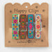 Set of three colorful happy clips arranged together, showcasing their cheerful designs and vibrant colors.
