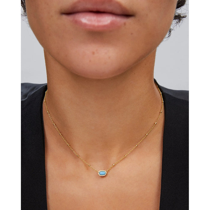 Kendra Scott Mini Elisa Satellite Short Pendant Necklace in variegated turquoise magnesite worn at collarbone