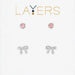 Chic gold quatrafoil drop earrings for casual, festive, and party outfits