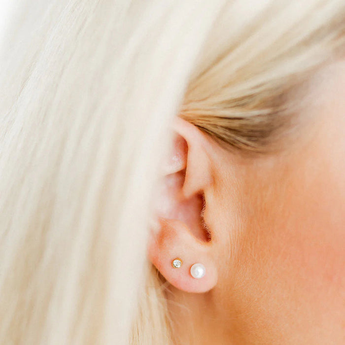 These 5mm simple pearl studs offer a timeless and elegant design that is perfect for any occasion.
