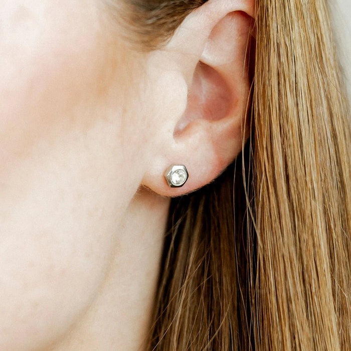 Crafted from 100% surgical-grade stainless steel with a silver-plated finish, these earrings are both lightweight and durable, making them the perfect waterproof staple for everyday wear.