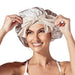 The DM Merchandising Lemon Lavender Snooze Control Satin Sleep Bonnet protects your hair while you sleep