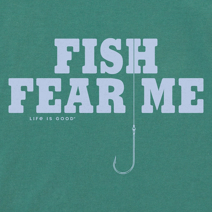 Close-up of Life is Good Fish Fear Me Crusher Tee – men's green fishing t-shirt with hook graphic and bold slogan