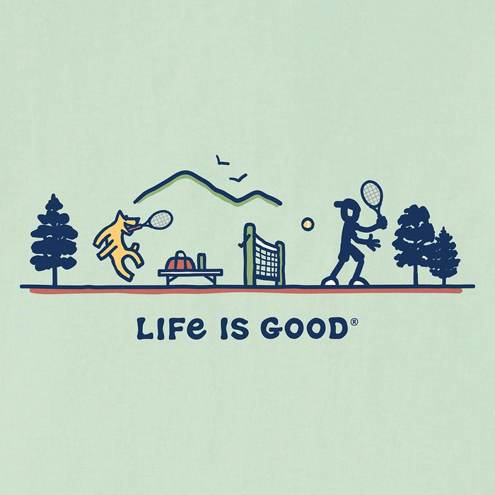 Close-up of Life is Good Jake Rocket Tennis graphic – men's mint green tee with dog and person tennis match illustration