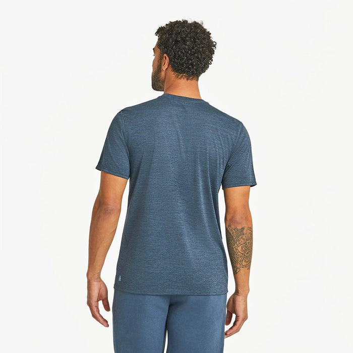 solid navy blue cotton t-shirt with short sleeves, shown on male model.