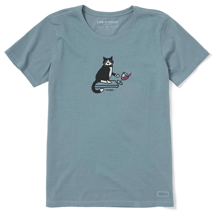 Life is Good Women’s Oops Cat Crusher Tee in blue featuring black and white cat knocking over wine glass with Ooops text.