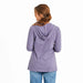 Back view of woman wearing Life Is Good Women’s Pet Paw Crusher Hooded Tee in purple stripes