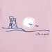 Life Is Good Women's Roam Beach Crusher Tee graphic close-up featuring minimalist lifeguard chair, sun, and seagulls on soft pink cotton fabric