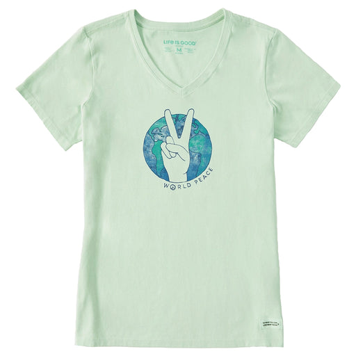Light green women’s V-neck tee featuring a graphic of a hand making the peace sign over a globe with the words “World Peace” below; design by Life is Good.