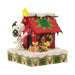 Snoopy decorating his red doghouse with Woodstock by his side, colorful Christmas lights, and a glowing Light-up yellow star on top.