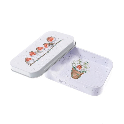 A tin box adorned with an artistic bird motif, showcasing vibrant colors.