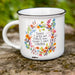 A coffee mug featuring an inspirational quote printed on its surface.