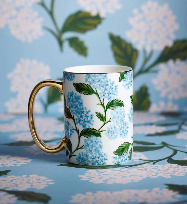 An elegant porcelain mug designed for enjoying your favorite coffee, tea, or hot beverages in style.